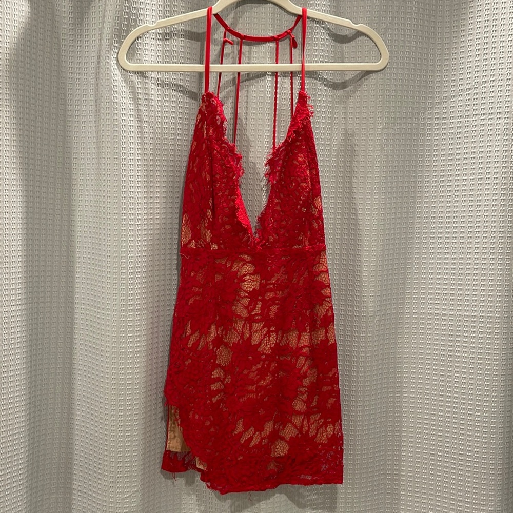 Red lace with nude under slip mini dress from Tobi. High side slit. Size Small.
